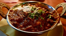 cooked food with tomato sauce