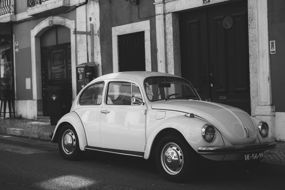 Volkswagen Beetle car parked near building