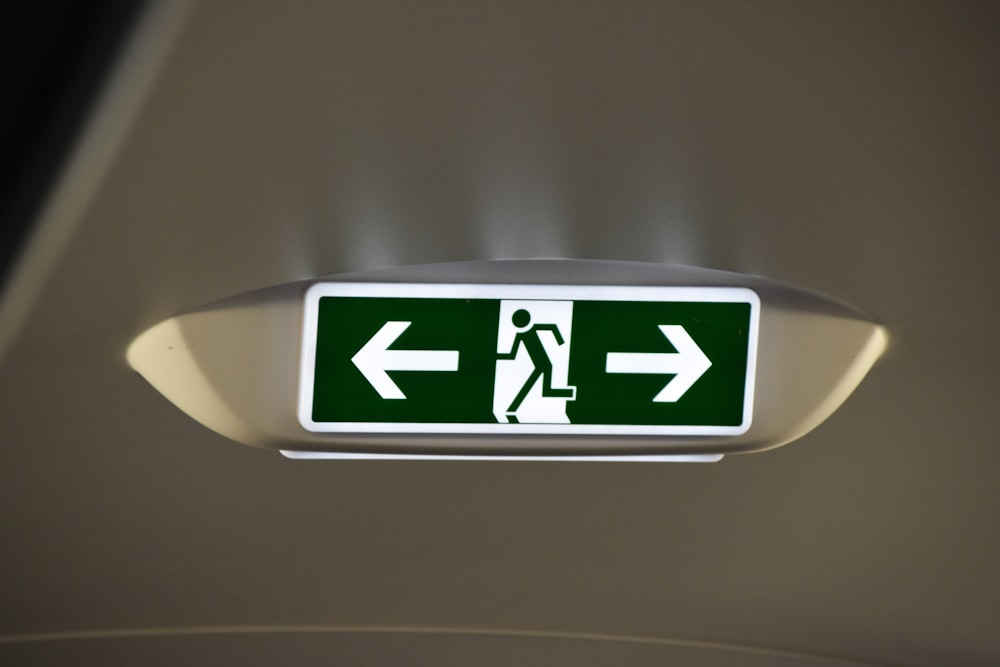green and white left and right arrow sign