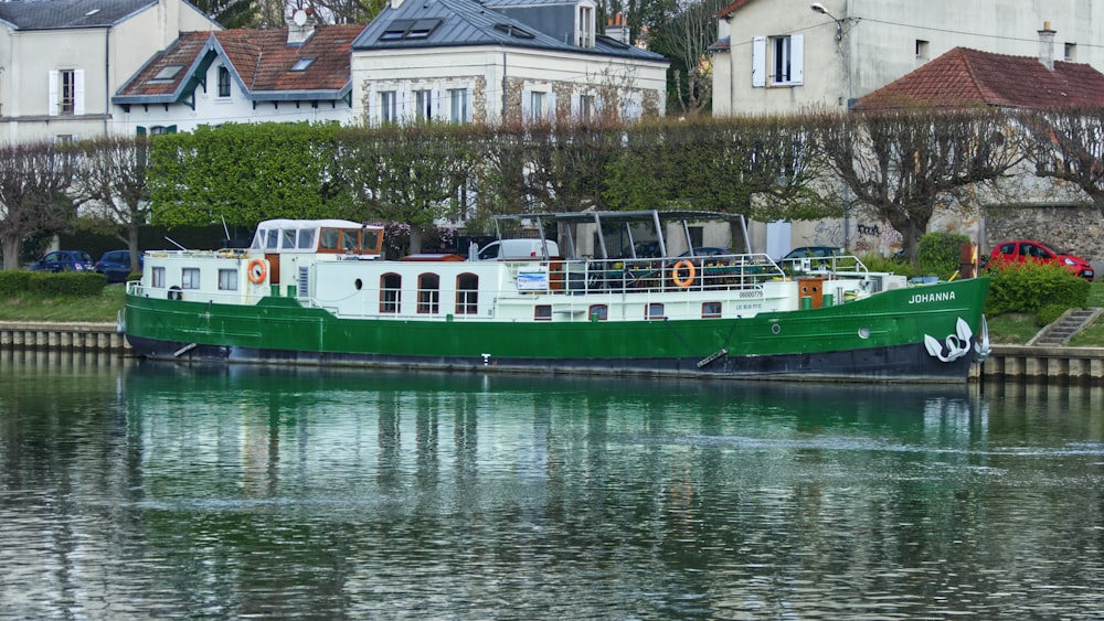 white vessels on body of water