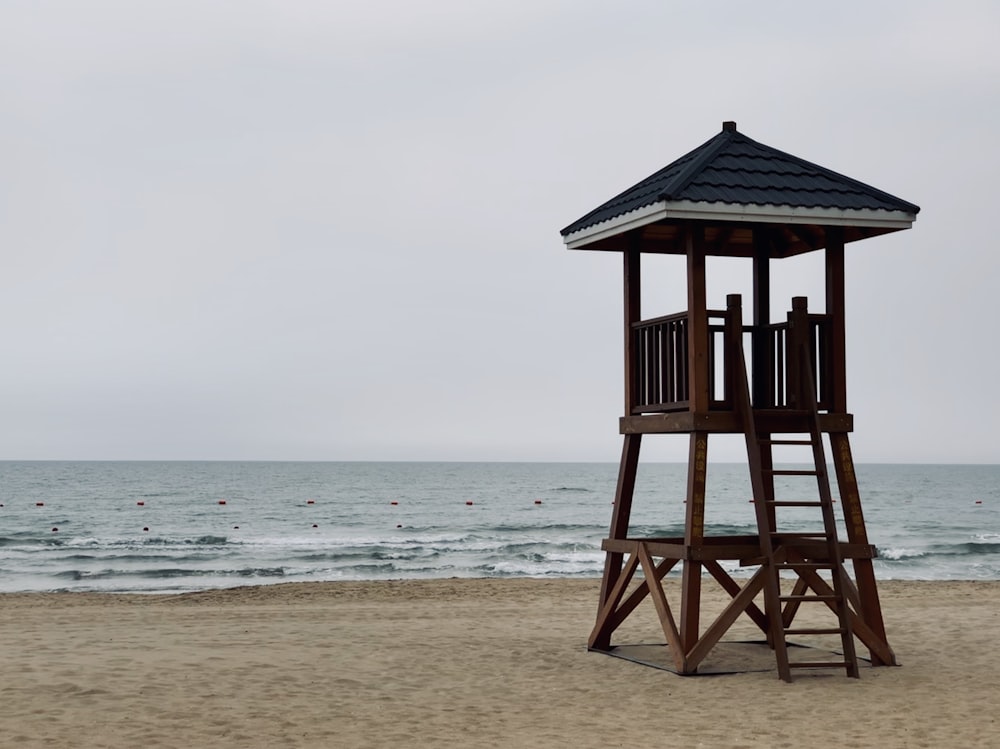 brown wooden lifeguard stall