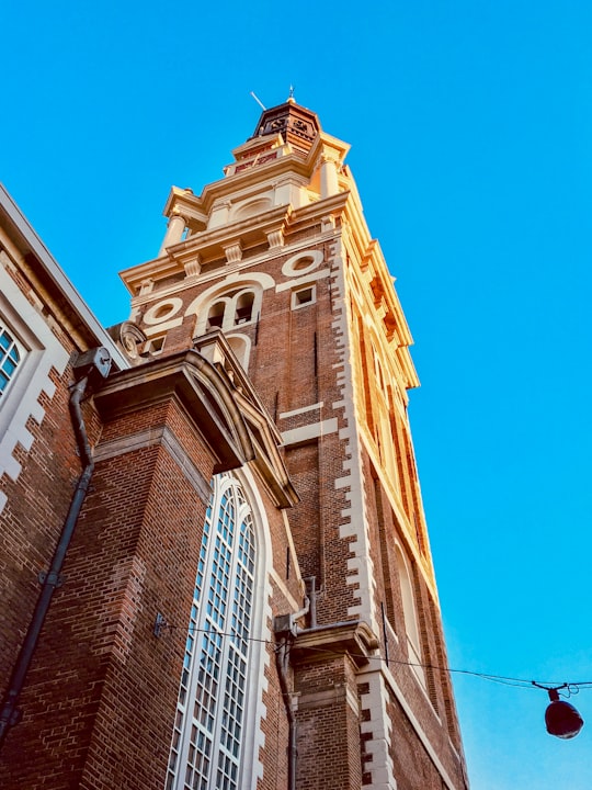 brown and beige high rise building in Zuiderkerk Netherlands