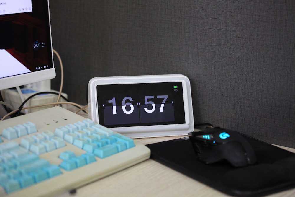 white digital table clock