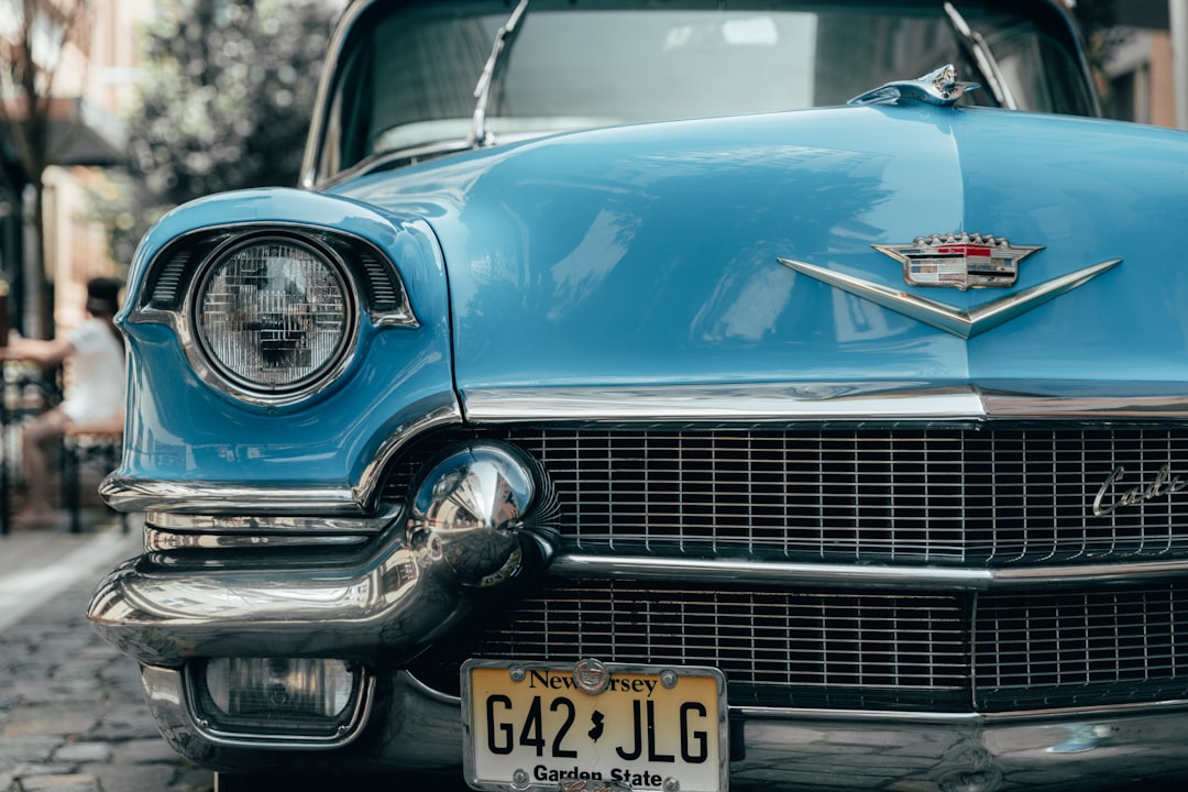 vintage blue Cadillac car