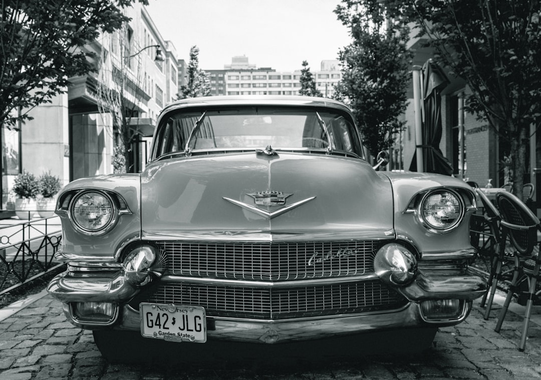 grayscale photography of vintage car