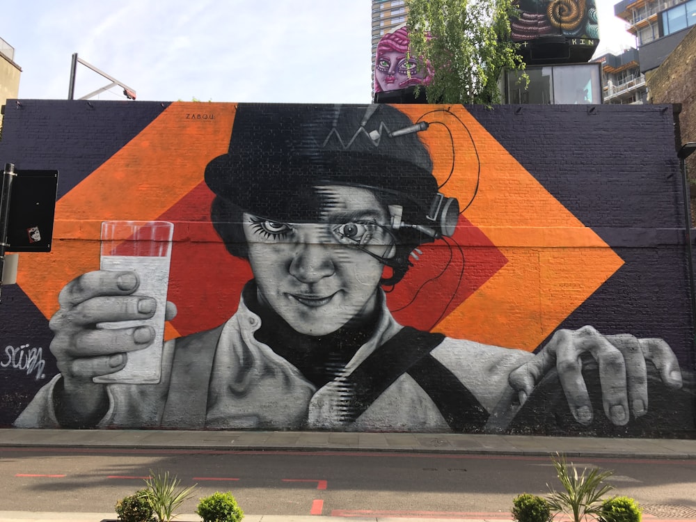 man holding glass of milk mural painting
