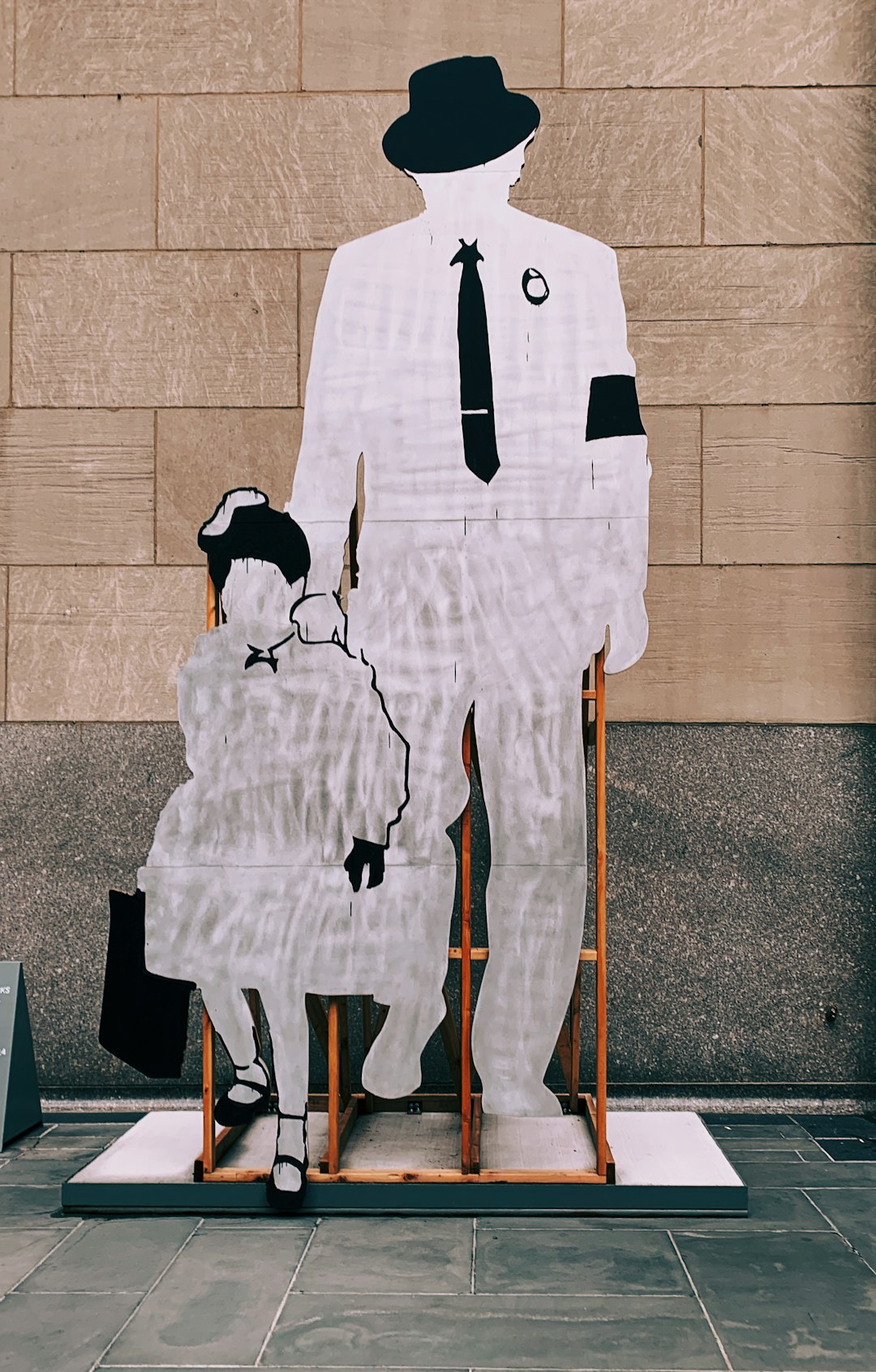 man and child cut-out board standee