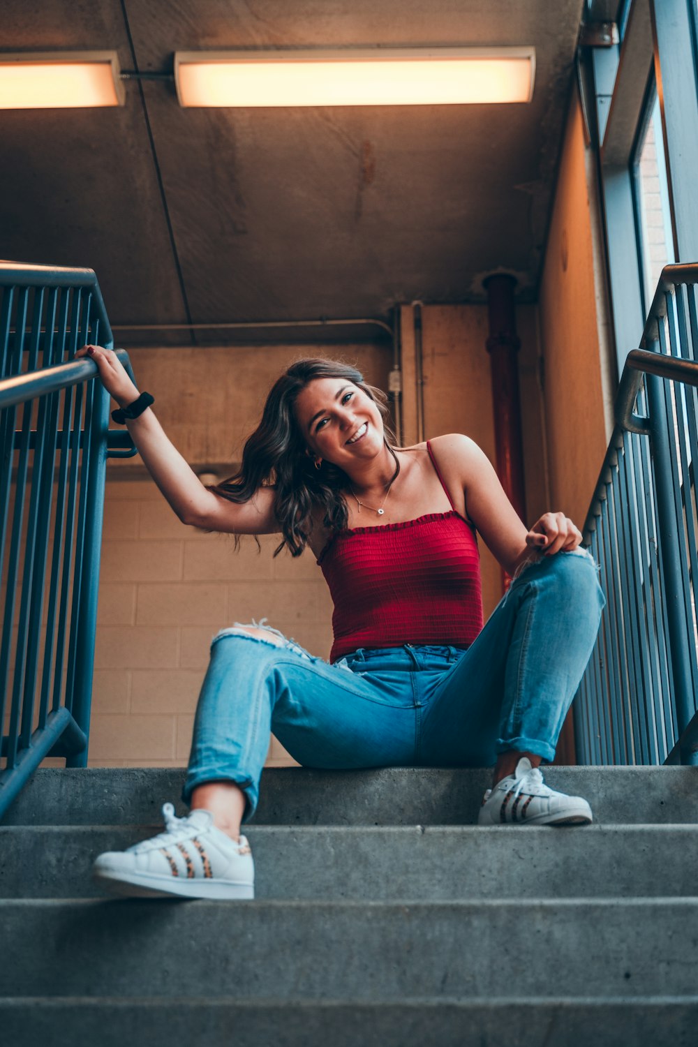 woman sitting on stair