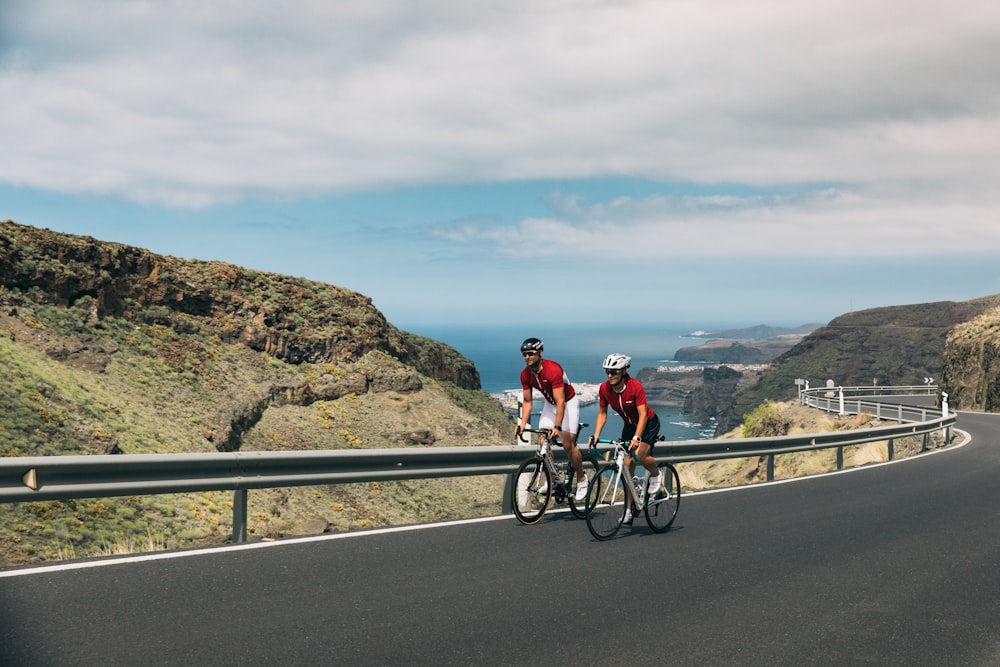 man and woman on bikes in highway