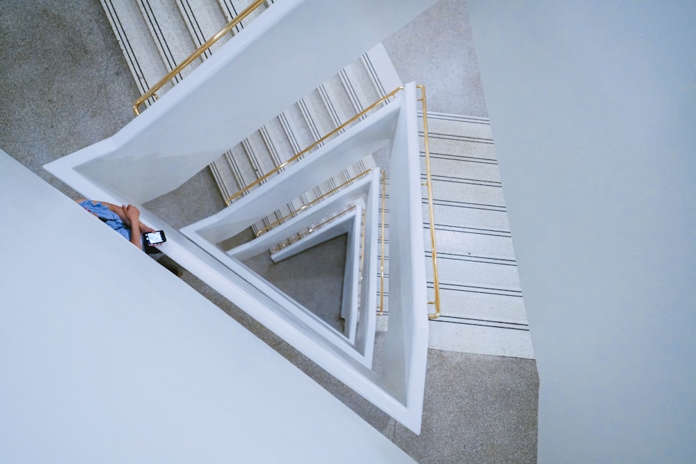 white wooden stair low-angle photography