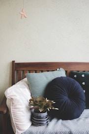 assorted throw pillows on sofa