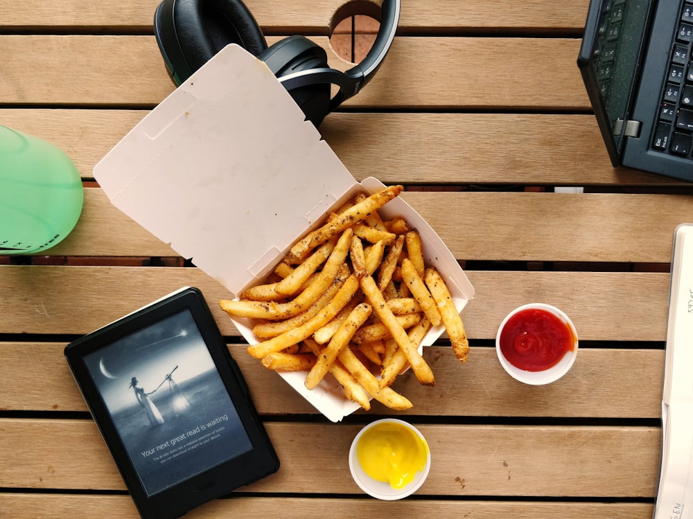 fried potato with yellow and red dips