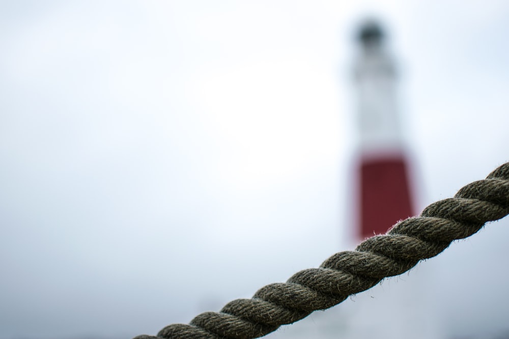 selective focus of brown rope during daytime