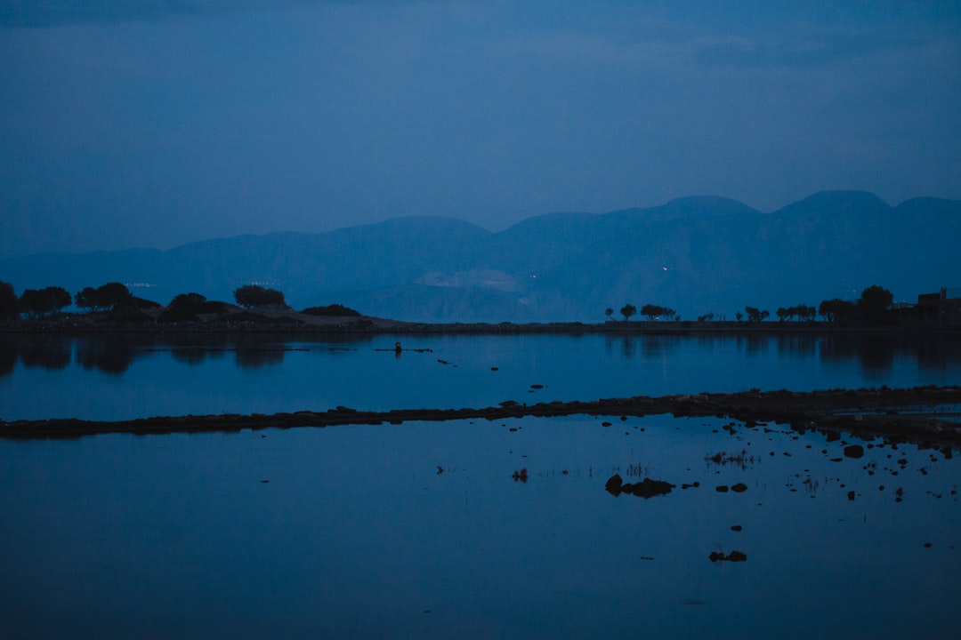 body of water during blue hour