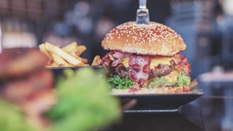 selective focus photo of burger with bacon