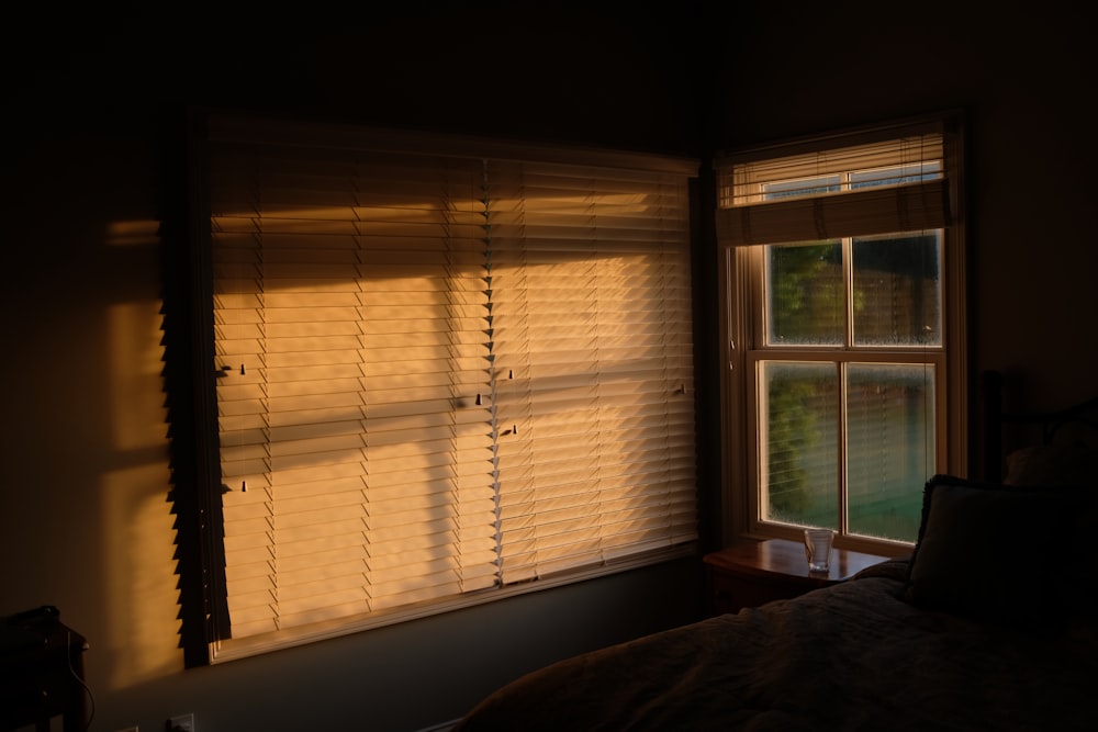 grey wooden framed glass window