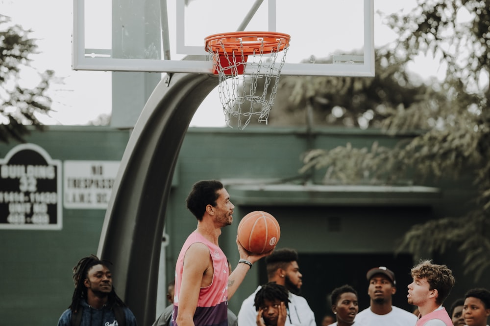 man holding basketball