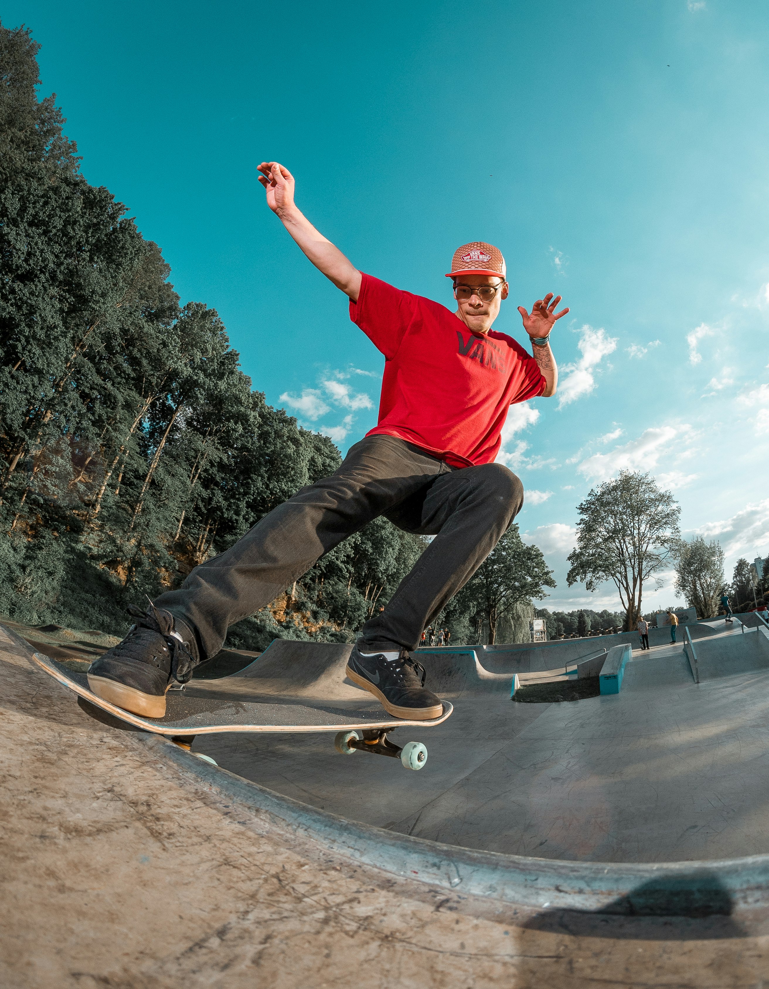 man riding skateboard on skate park during daytime