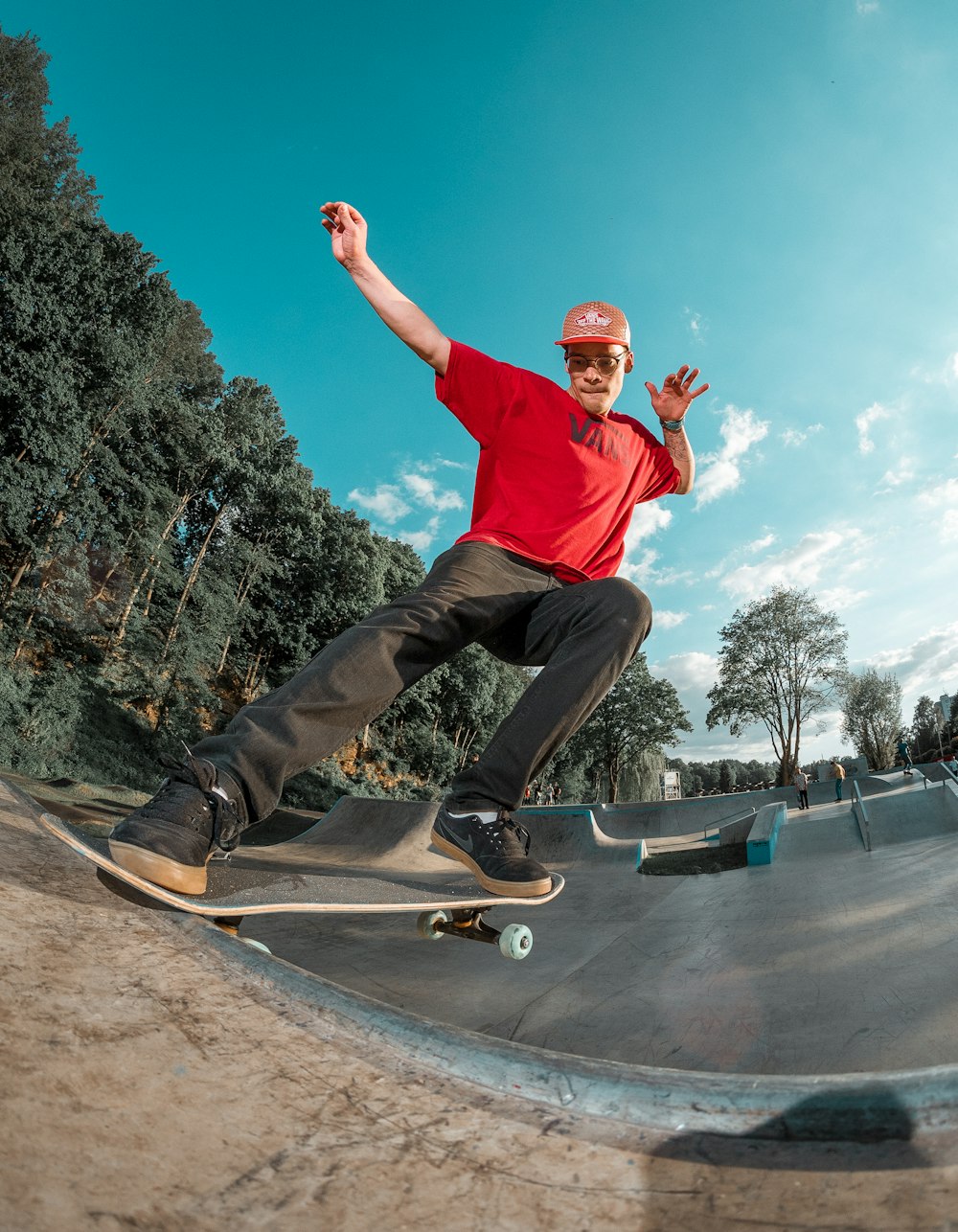 man riding skateboard on skate park during daytime