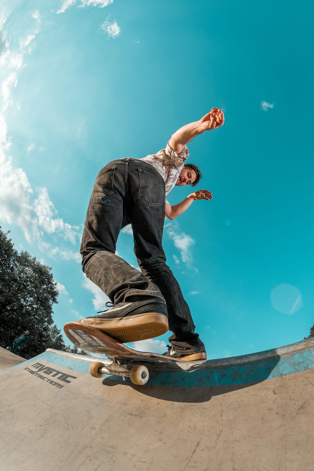 man skateboarding at park