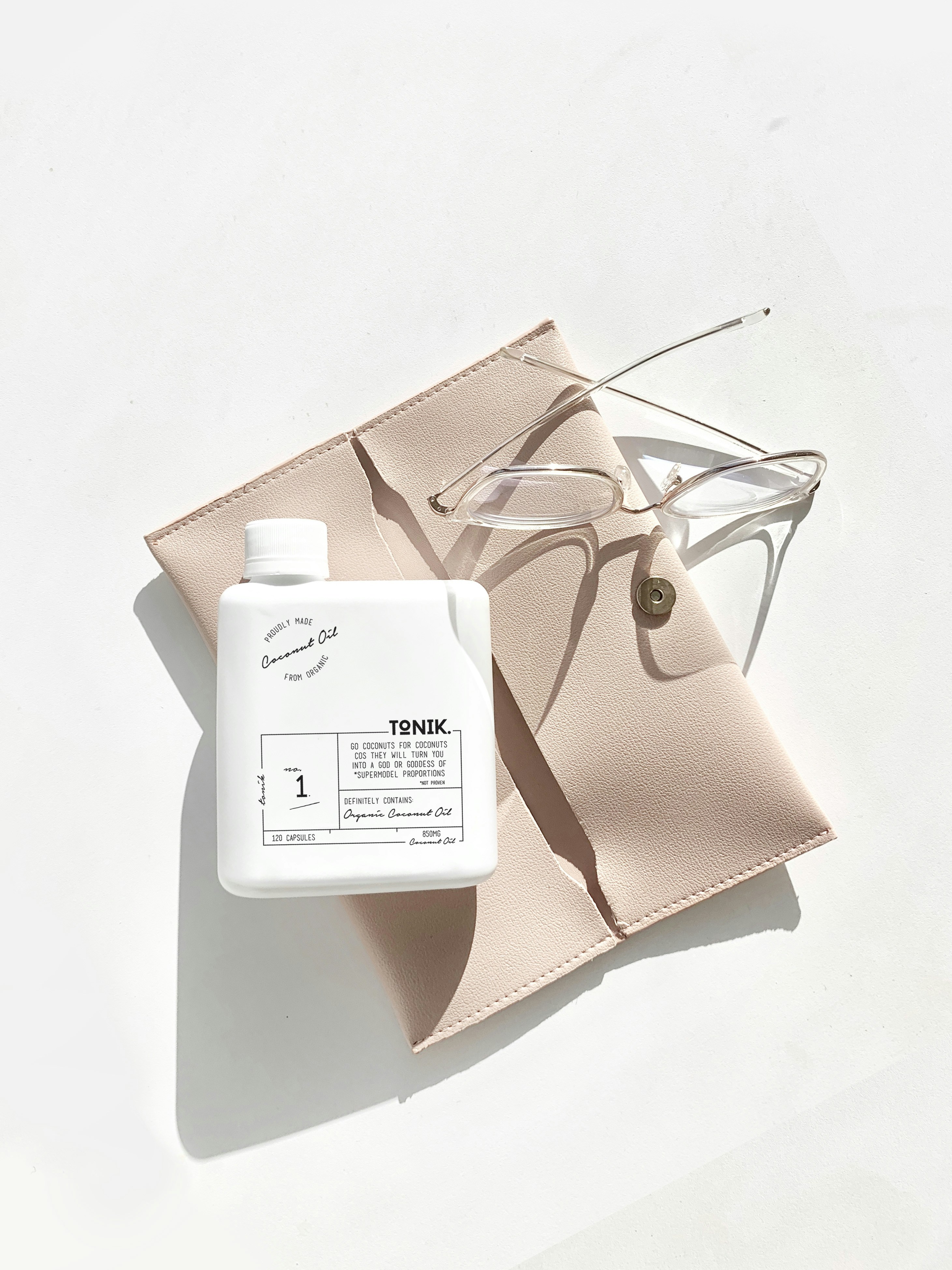 white and black labeled bottle