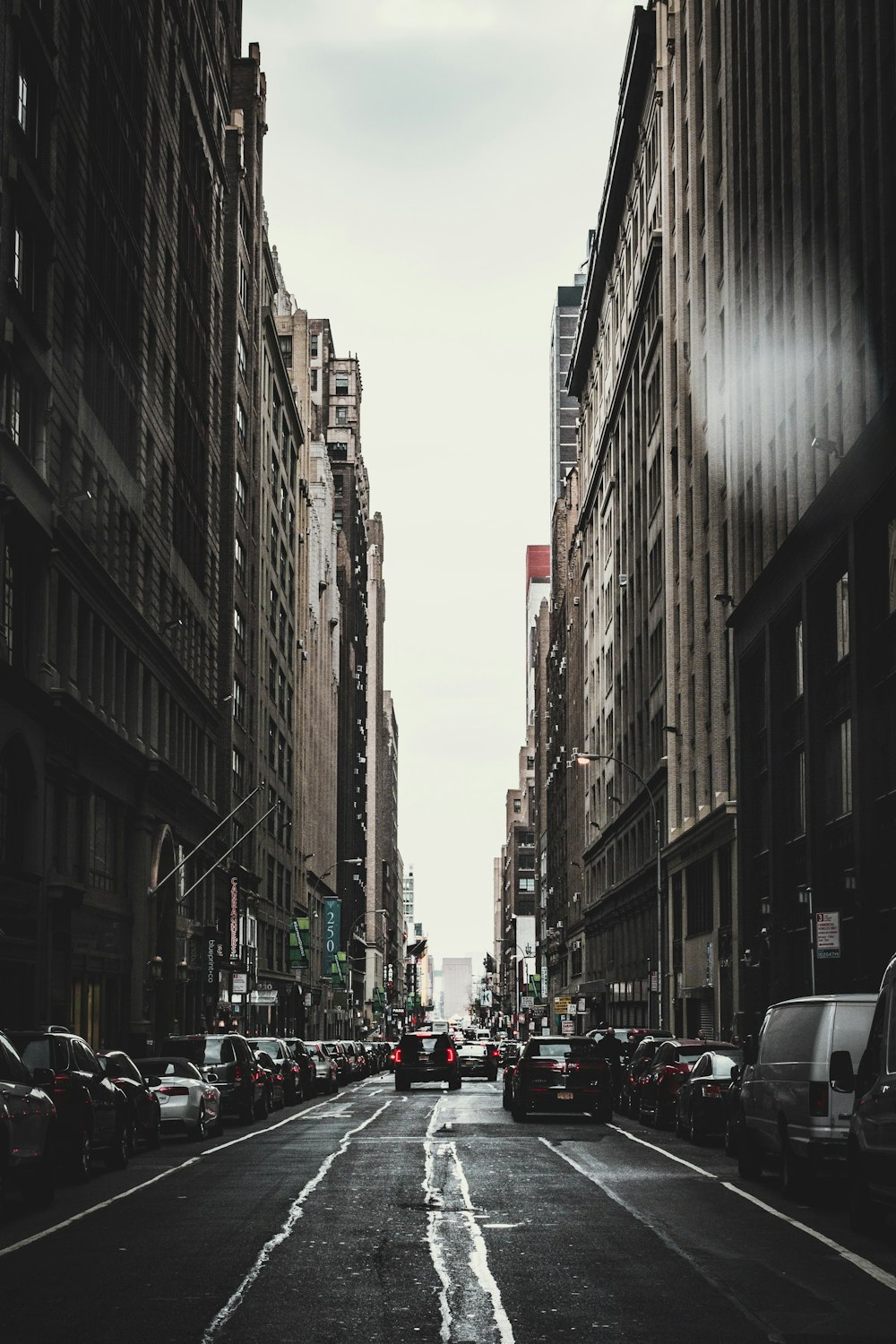 black vehicles at road during daytime