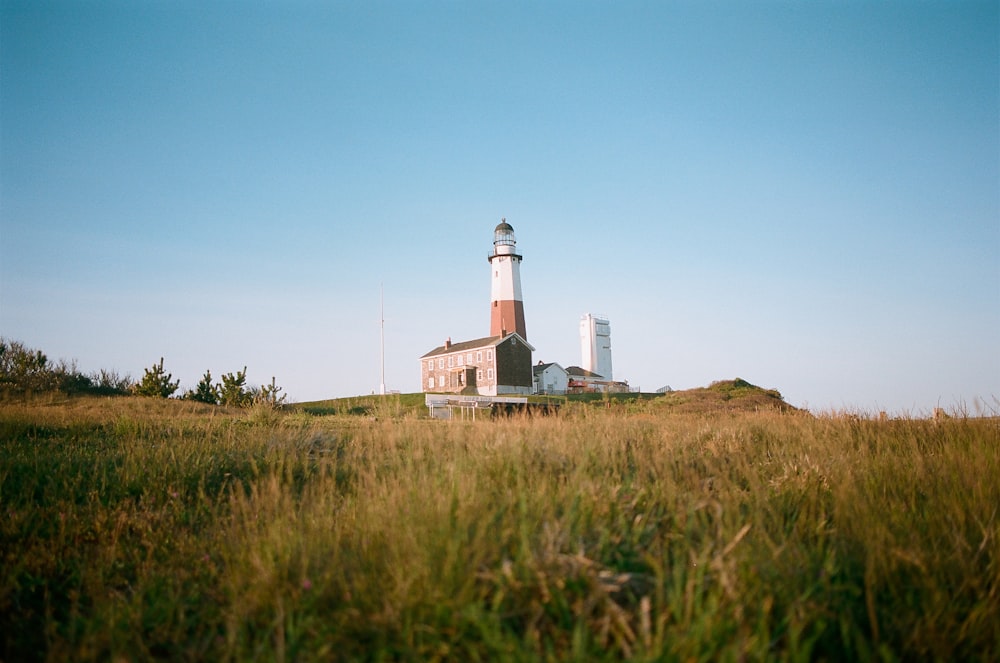 lighthouse under blue sky