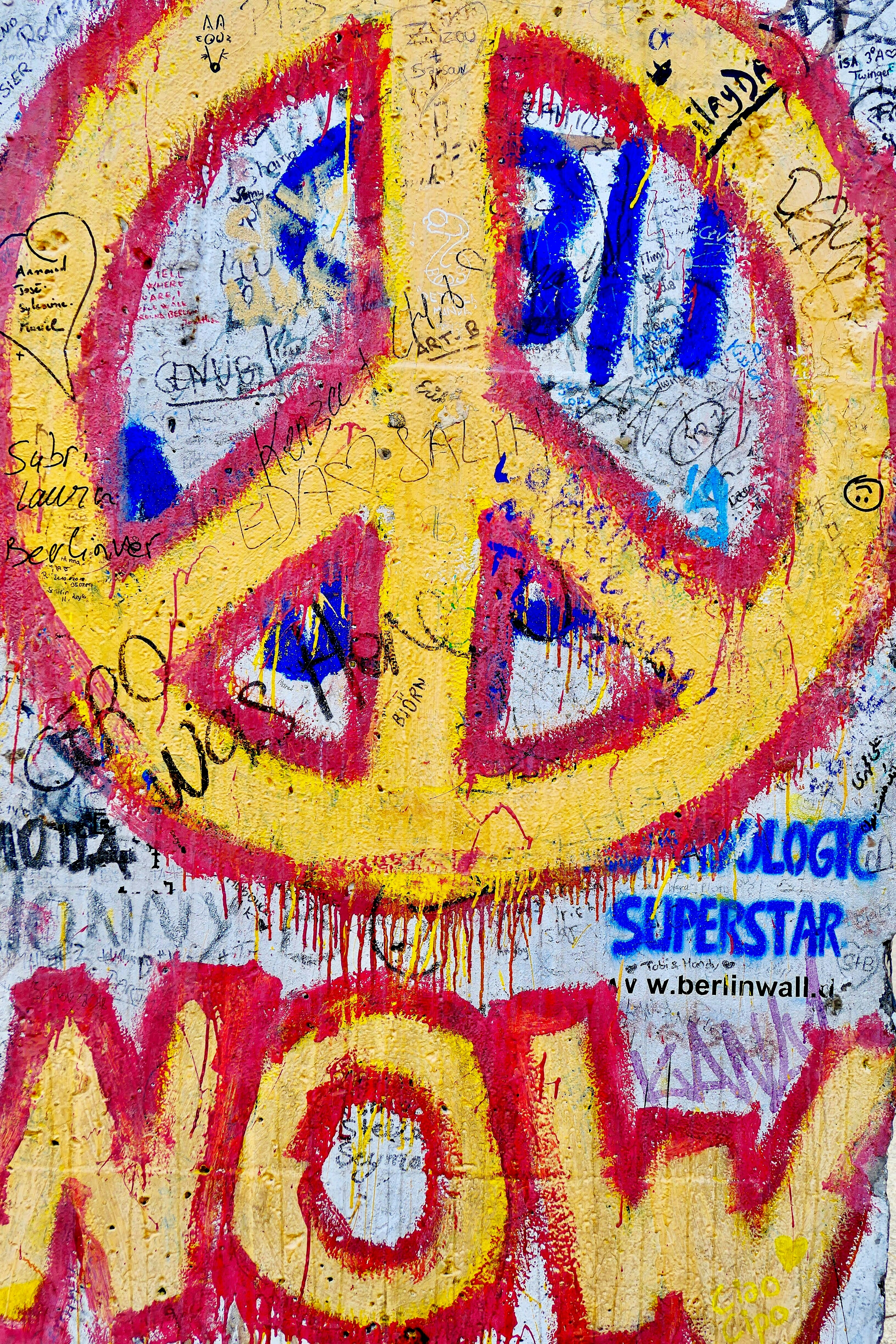 yellow and red peace sign