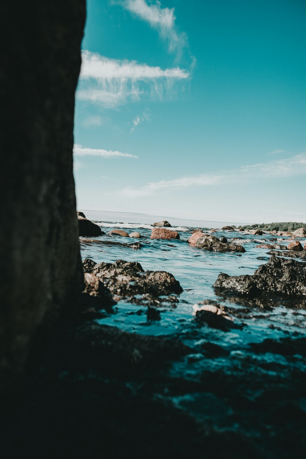 rock formations on seashore during daytime