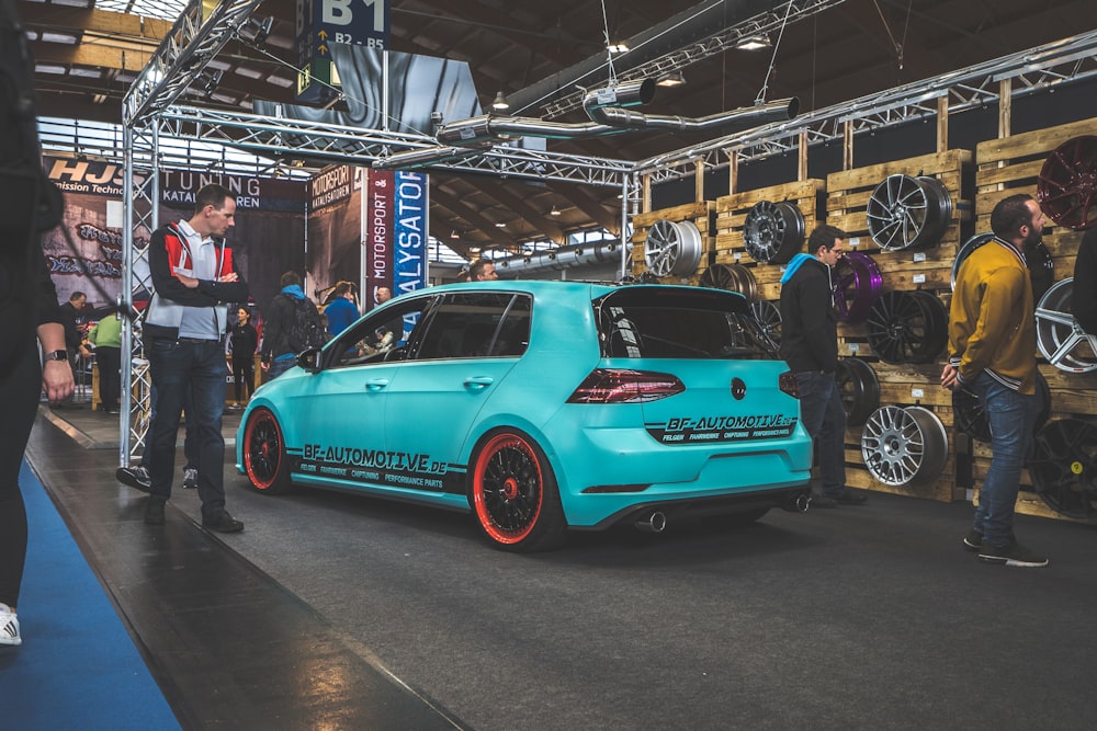 green 5-door hatchback on road