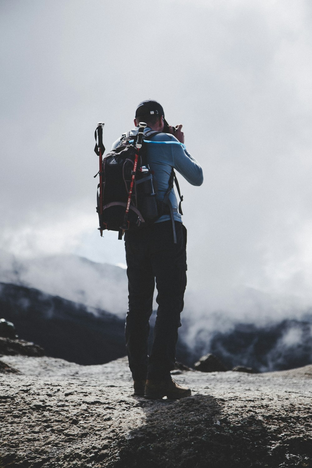 man taking photo of nature