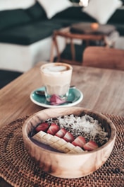 food photography of sliced bananas and strawberries beside rice