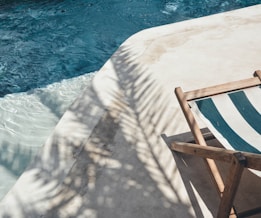 wooden lounger on a tranquil shore