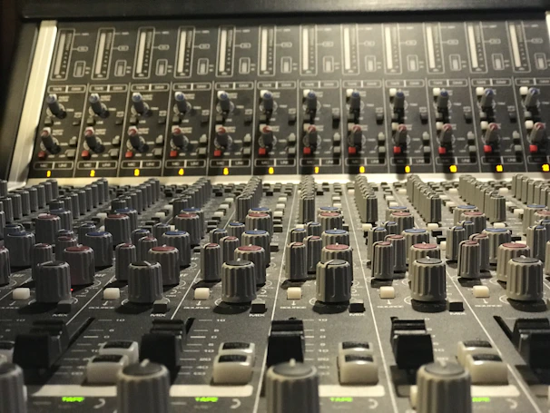 Close-up of professional speakers and mixing console arranged neatly for an event