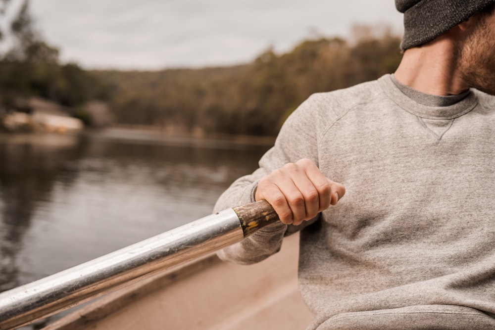 person riding boat during daytime