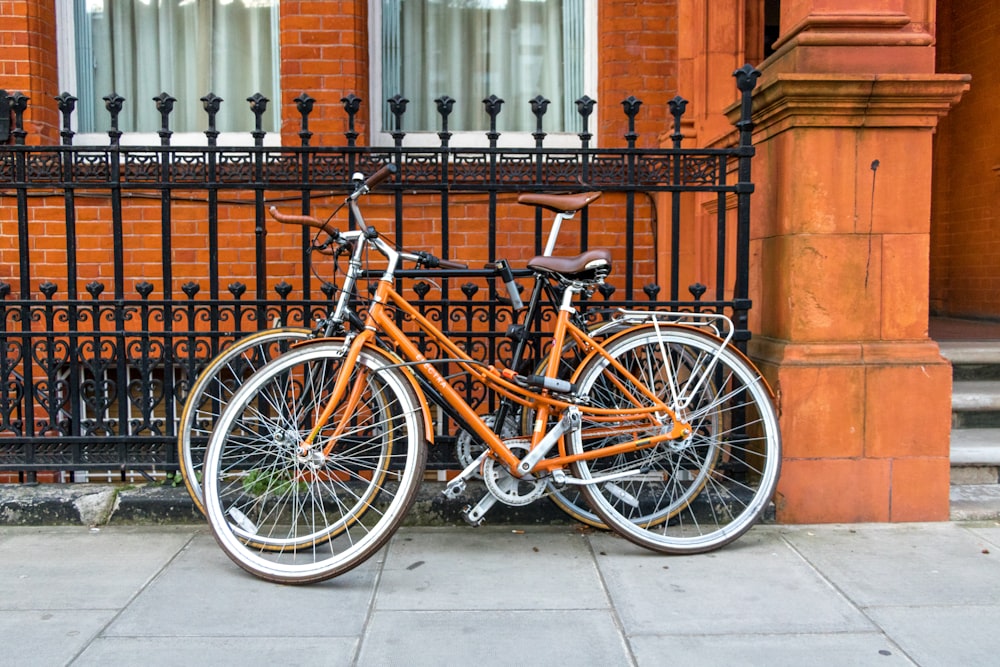two brown and grey city bikes