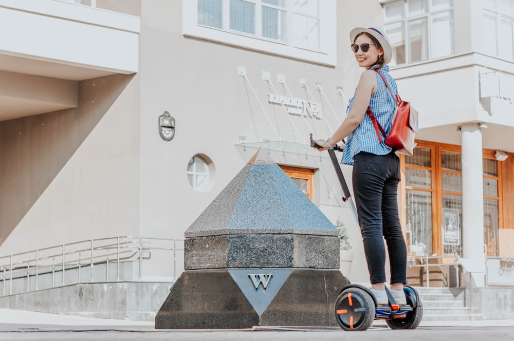 woman in a ride-on balancing board