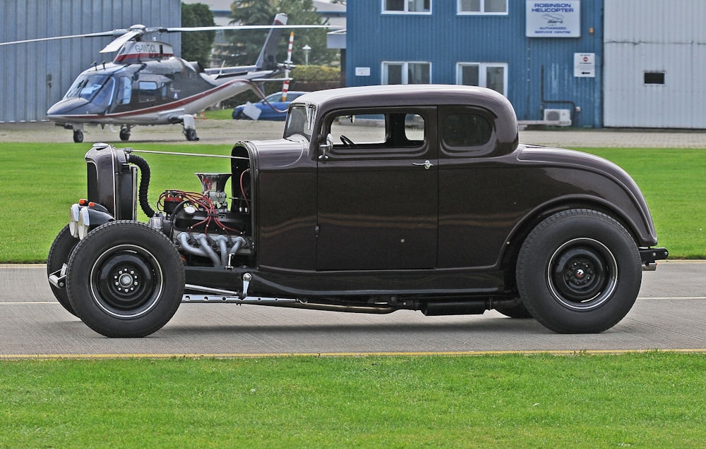 classic black car on road