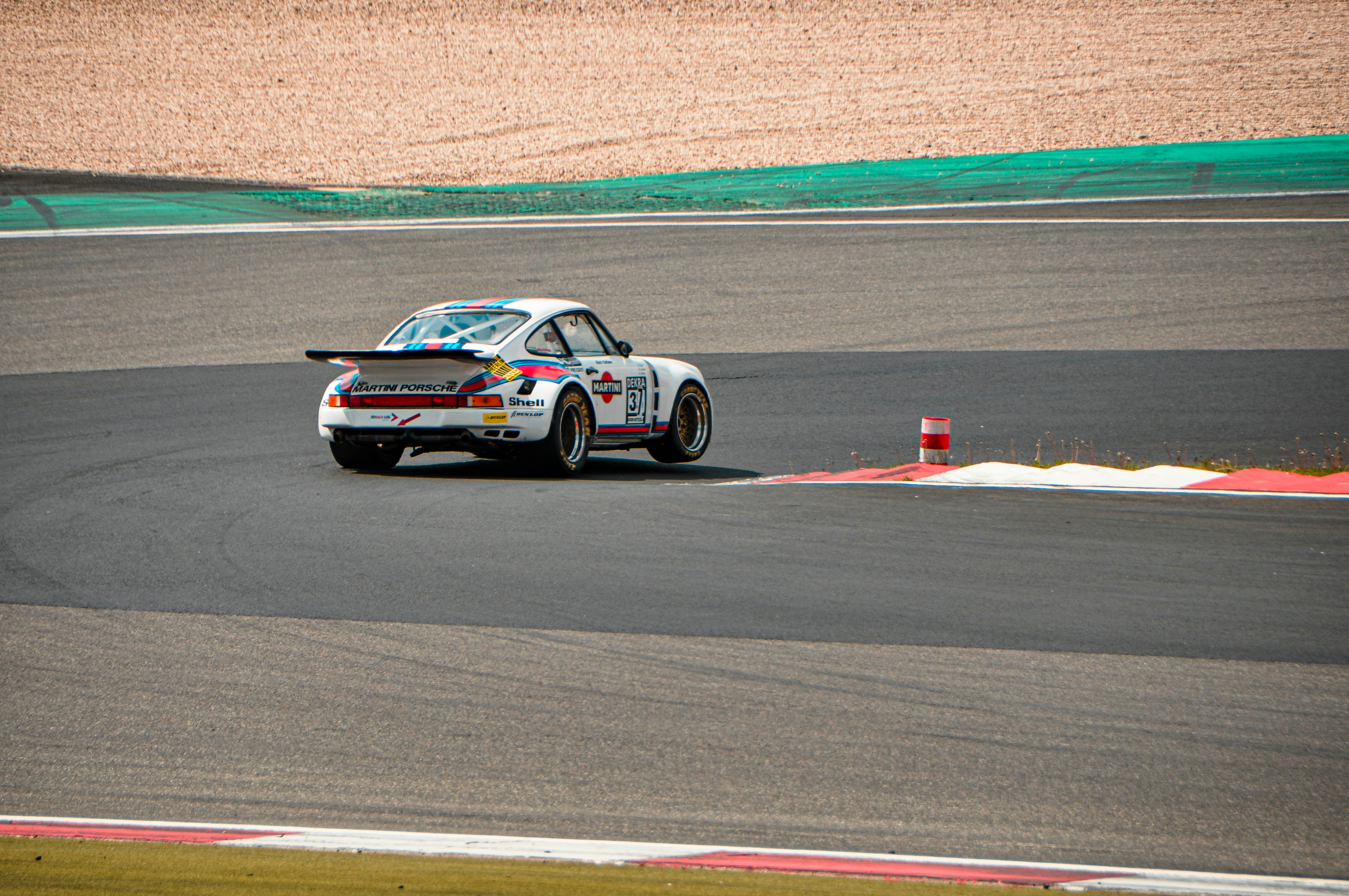 white sports car in a race track, 