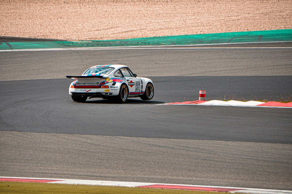 white sports car in a race track