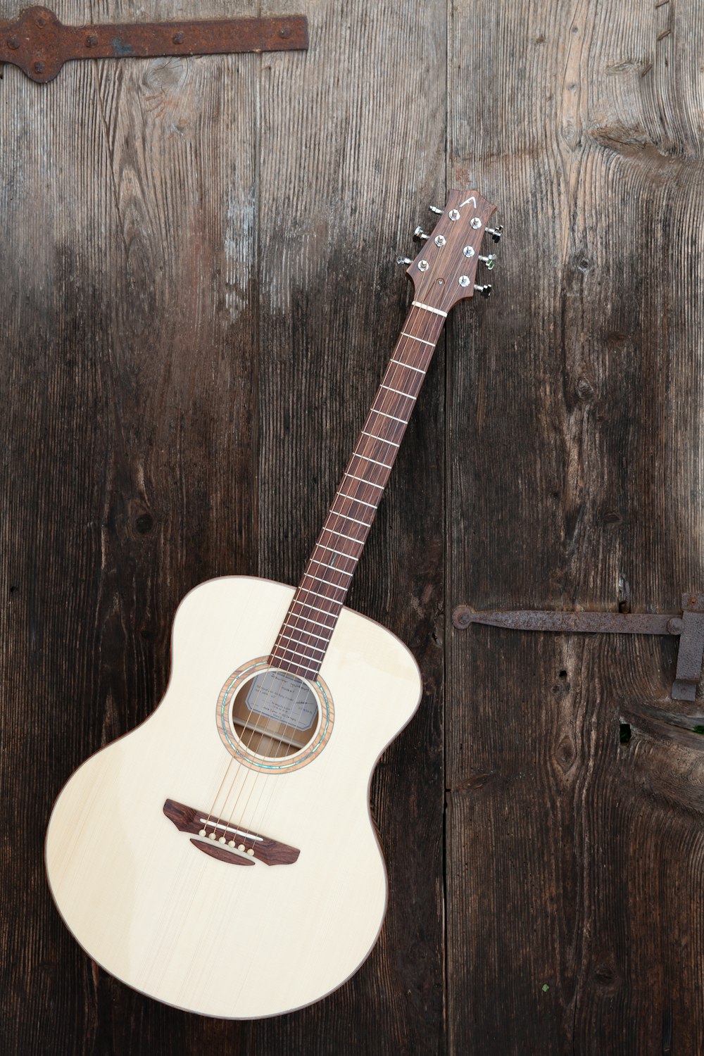 white acoustic guitar