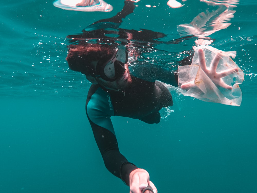 man swimming underwater