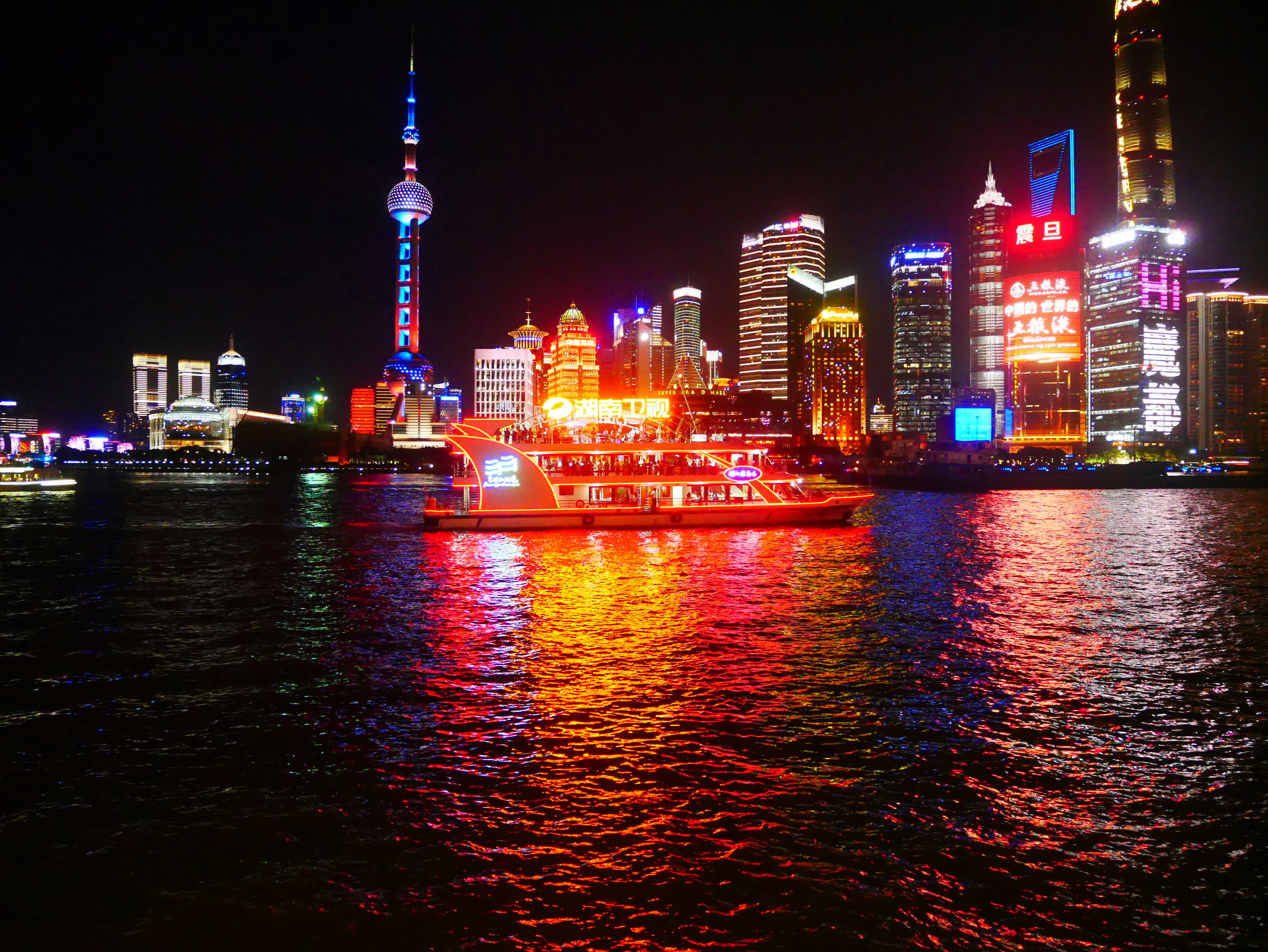 lighted city skyline by the bay