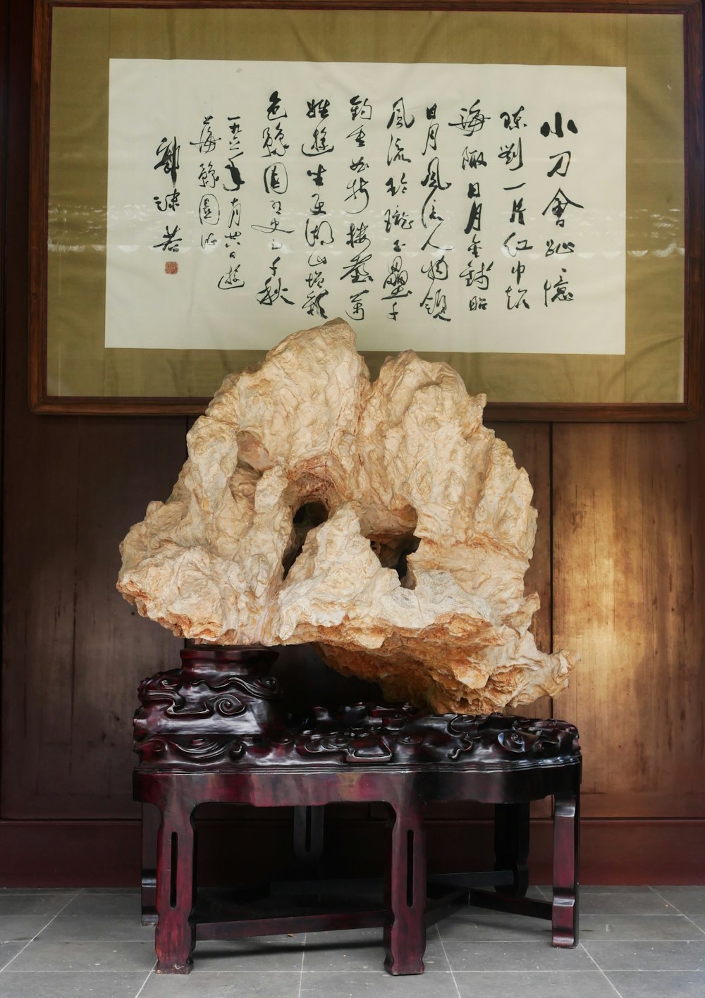 brown stone ornament on wooden table