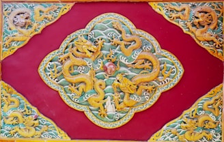 A striking black dragon intertwined with red and gold Asian motifs, surrounded by playing cards and dice.