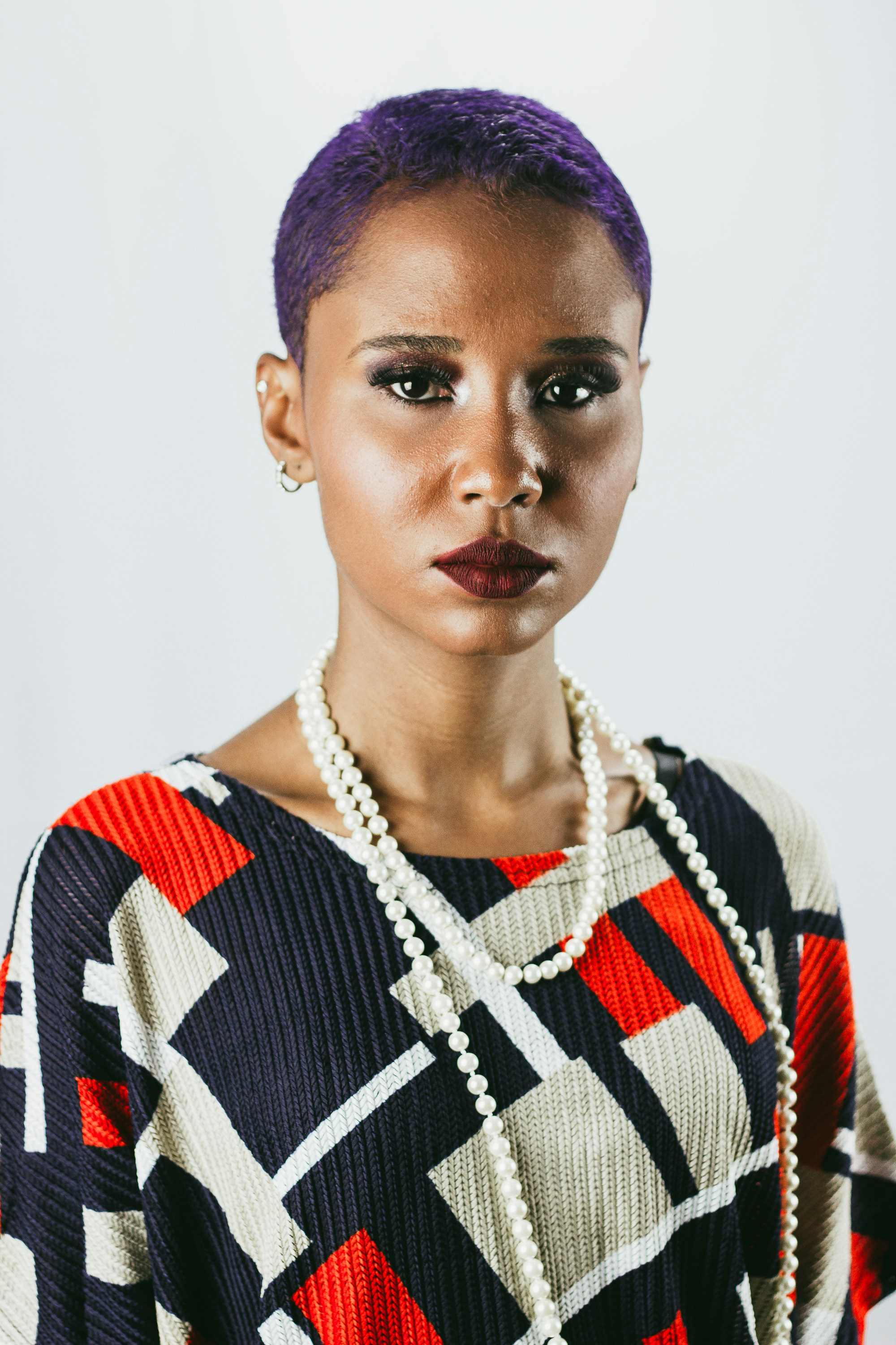 woman wearing multicolored crew-neck top