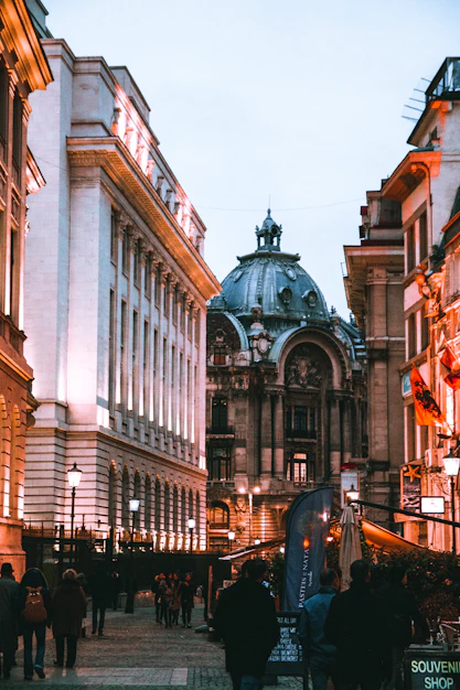 people walking beside buildings
