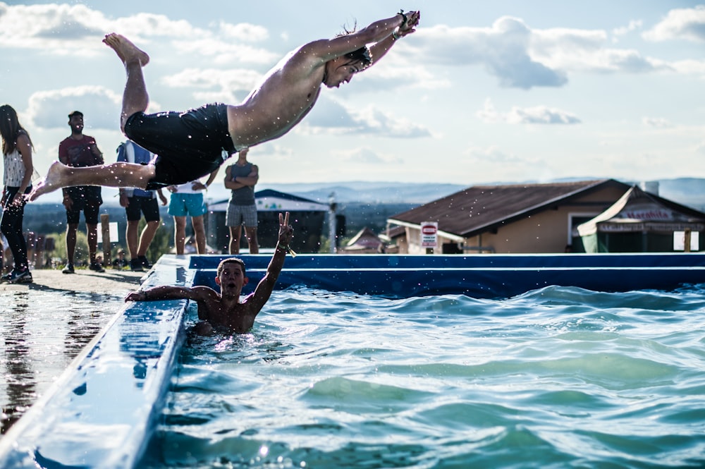 people near swimming pool