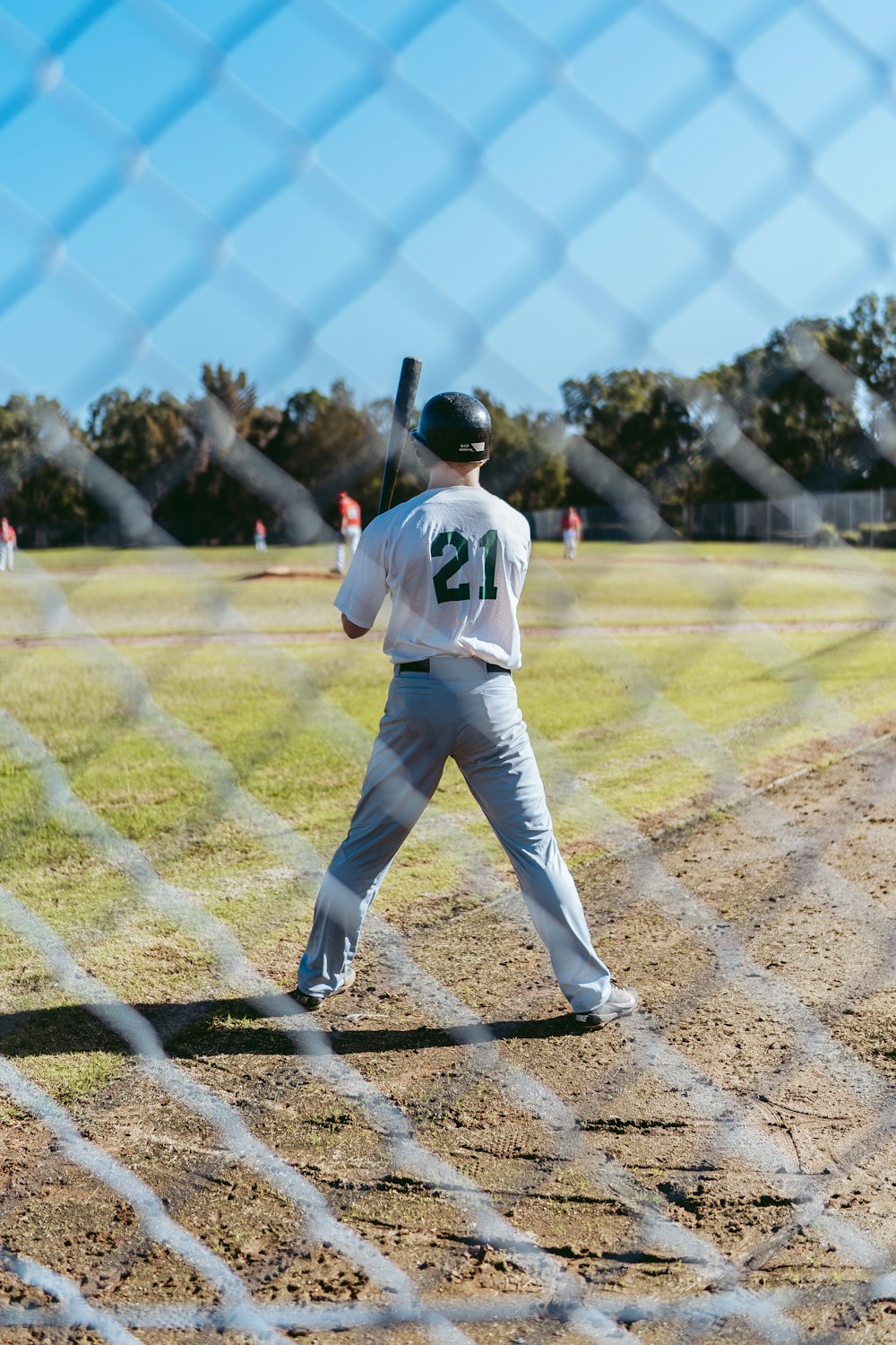 baseball player near fence