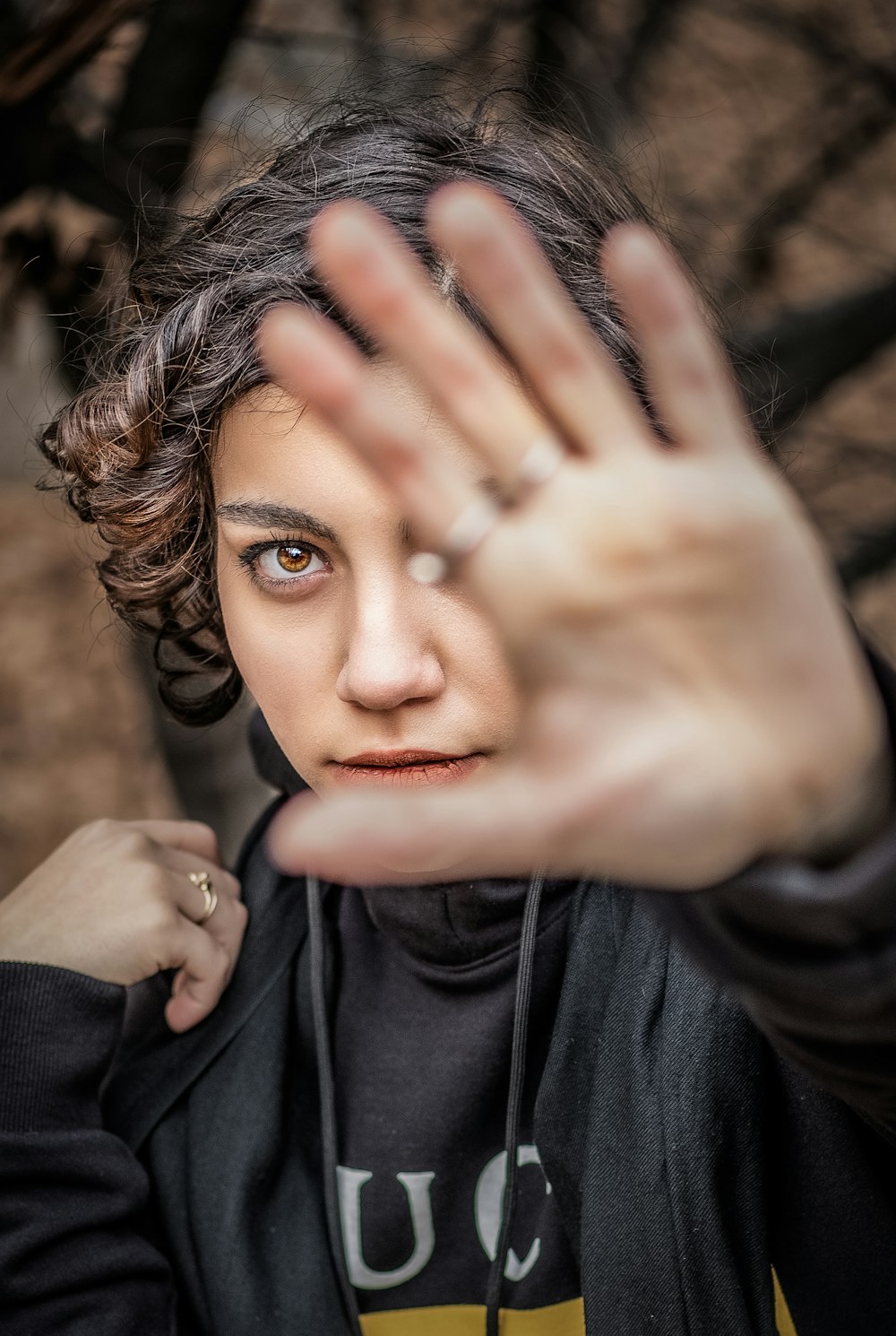 woman covering her face